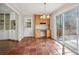 Bright breakfast room with terracotta floor and sliding glass doors to deck at 2773 Townley Cir, Atlanta, GA 30340