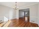 Bright dining room hardwood floors, access to living room at 2773 Townley Cir, Atlanta, GA 30340