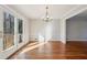 Bright dining room with hardwood floors and chandelier, leading to deck at 2773 Townley Cir, Atlanta, GA 30340