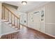 Brick floor entryway with wooden staircase and interior door at 2773 Townley Cir, Atlanta, GA 30340