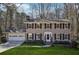 Two-story house with gray siding, black shutters, and a white front door at 2773 Townley Cir, Atlanta, GA 30340