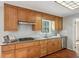 Bright kitchen with granite countertops, stainless steel appliances, and terracotta tile floors at 2773 Townley Cir, Atlanta, GA 30340