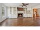 Spacious living room with hardwood floors, fireplace, and built-in shelving at 2773 Townley Cir, Atlanta, GA 30340