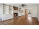 Spacious living room with hardwood floors, fireplace, and built-in shelving at 2773 Townley Cir, Atlanta, GA 30340