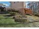 Landscaped yard with stone retaining wall at 2773 Townley Cir, Atlanta, GA 30340