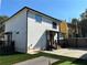 Side yard view showing modern house exterior, artificial turf, and bocce ball at 429 Grant Se St, Atlanta, GA 30312