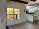 Bright living room featuring hardwood floors and a view into the kitchen at 429 Grant Se St, Atlanta, GA 30312