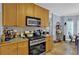 Spacious kitchen featuring a gas range and breakfast nook at 625 Piping Rock Pt, Lawrenceville, GA 30043