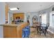 Kitchen featuring breakfast bar and breakfast nook at 625 Piping Rock Pt, Lawrenceville, GA 30043