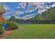 Outdoor tennis court surrounded by greenery, providing a recreational amenity at 625 Piping Rock Pt, Lawrenceville, GA 30043