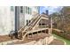 Multi-level deck with stairs leading to backyard at 714 Settlers Xing, Canton, GA 30114