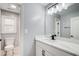 Well-lit bathroom with modern vanity, white marble countertop, and black fixtures at 2170 Charleston Pl, Lithia Springs, GA 30122