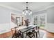 Dining room with large windows and modern decor at 2170 Charleston Pl, Lithia Springs, GA 30122