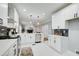 Modern kitchen featuring stainless steel appliances, quartz countertops, and open layout at 2170 Charleston Pl, Lithia Springs, GA 30122