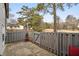 Private patio with wooden fence and gate at 257 Country Club Dr, Jonesboro, GA 30238