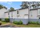 Charming townhome with a fenced yard and a manicured lawn at 257 Country Club Dr, Jonesboro, GA 30238