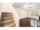 Spacious living room with hardwood floors and an abundance of natural light at 257 Country Club Dr, Jonesboro, GA 30238