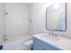 Bathroom with white subway tile, marble vanity, and a tub at 359 Woodward Se Ave, Atlanta, GA 30312