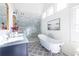 Bright bathroom with double vanity, soaking tub and walk-in shower at 359 Woodward Se Ave, Atlanta, GA 30312