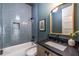 Modern bathroom with gray tile shower and floating vanity at 359 Woodward Se Ave, Atlanta, GA 30312