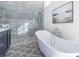 Spa-like bathroom featuring a soaking tub and walk-in shower at 359 Woodward Se Ave, Atlanta, GA 30312