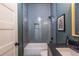 Modern bathroom with gray tile shower and floating vanity at 359 Woodward Se Ave, Atlanta, GA 30312