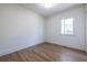 Bright bedroom with hardwood floors and a window at 359 Woodward Se Ave, Atlanta, GA 30312