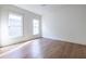 Bright bedroom with hardwood floors and an ensuite bathroom at 359 Woodward Se Ave, Atlanta, GA 30312