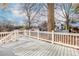 Backyard deck with white railings and view of trees at 359 Woodward Se Ave, Atlanta, GA 30312