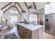 Bright kitchen with island, stainless steel appliances, and vaulted ceiling at 359 Woodward Se Ave, Atlanta, GA 30312