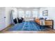 Cozy sitting area with a blue patterned rug and comfy furniture at 359 Woodward Se Ave, Atlanta, GA 30312