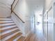 Elegant staircase with wooden steps and a classic white railing at 359 Woodward Se Ave, Atlanta, GA 30312