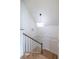 Modern staircase with white railings and wood flooring at 359 Woodward Se Ave, Atlanta, GA 30312