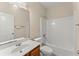 Full bathroom featuring a shower-tub combo and wood vanity at 498 Anglewood Trce, Stockbridge, GA 30281