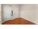 Bedroom featuring wood floors and white doors at 498 Anglewood Trce, Stockbridge, GA 30281