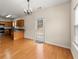 Dining area with hardwood floors and access to kitchen at 498 Anglewood Trce, Stockbridge, GA 30281