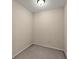 Empty room with neutral paint and carpeting, offering a blank canvas for customization and various uses at 498 Anglewood Trce, Stockbridge, GA 30281