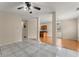 Living room with open floor plan to kitchen and dining area at 498 Anglewood Trce, Stockbridge, GA 30281