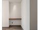 Chic alcove with a sleek floating wood shelf, offering a stylish and minimalist storage solution within the home at 3630 Peachtree Ne Rd # 2207, Atlanta, GA 30326