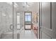 Luxurious bathroom with a soaking tub, glass-enclosed shower, and a double vanity with marble countertops at 3630 Peachtree Ne Rd # 2207, Atlanta, GA 30326