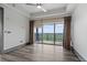 Spacious bedroom with hardwood floors, large windows and a ceiling fan at 3630 Peachtree Ne Rd # 2207, Atlanta, GA 30326
