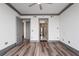 Spacious bedroom with modern paint scheme, hardwood flooring and access to both the bathroom and closet at 3630 Peachtree Ne Rd # 2207, Atlanta, GA 30326