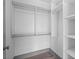 Well-organized walk-in closet with multiple shelves and rods to maximize storage and keep belongings tidy at 3630 Peachtree Ne Rd # 2207, Atlanta, GA 30326