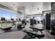 A modern gym featuring floor-to-ceiling mirrors, exercise equipment, and panoramic views of the city at 3630 Peachtree Ne Rd # 2207, Atlanta, GA 30326