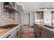 Modern kitchen featuring a gas range, tile backsplash, and stainless steel appliances at 3630 Peachtree Ne Rd # 2207, Atlanta, GA 30326