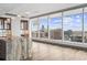 Open kitchen featuring a large island, modern lighting, and panoramic city views at 3630 Peachtree Ne Rd # 2207, Atlanta, GA 30326