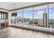 Bright living room featuring floor-to-ceiling windows showcasing a stunning city view at 3630 Peachtree Ne Rd # 2207, Atlanta, GA 30326