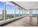 Expansive living area with floor-to-ceiling windows provides panoramic views of the city at 3630 Peachtree Ne Rd # 2207, Atlanta, GA 30326