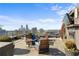 Stunning rooftop terrace with comfortable seating, outdoor fireplace and city views at 3630 Peachtree Ne Rd # 2207, Atlanta, GA 30326