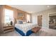 Serene main bedroom with decorative throw pillows, bedside tables, and an ensuite bathroom and walk-in closet at 146 Oakchase Park Ln, Hampton, GA 30228